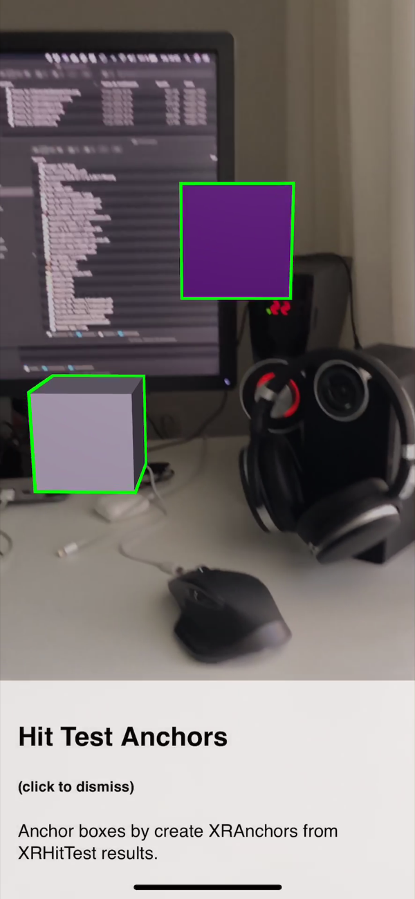 The hit test example, with two cubes anchored in the room at different heights